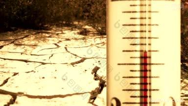 温度表上的温度快速上升，背景处旱季地面出现大裂缝